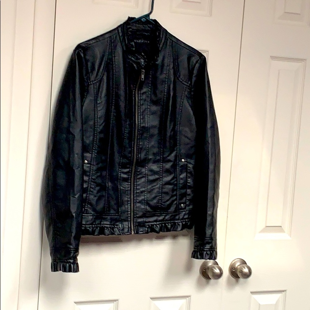 Black leather jacket with stitching details.